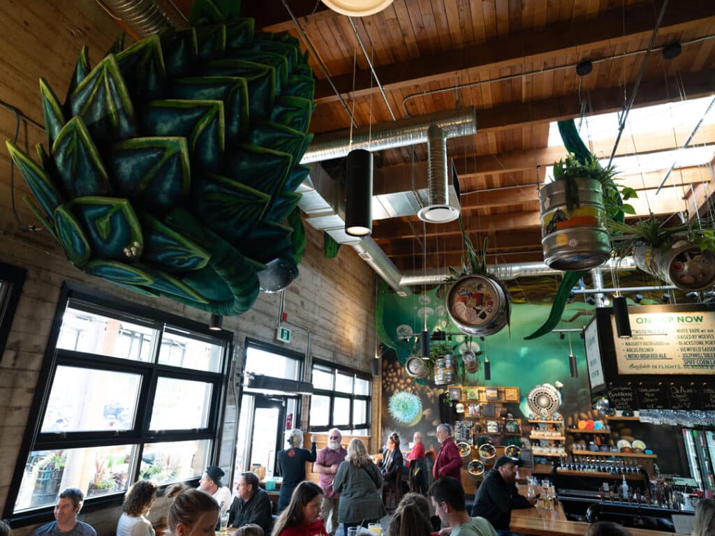 Driftwood's tap room is lively, bright, and full of one-of-a-kind art and merch!