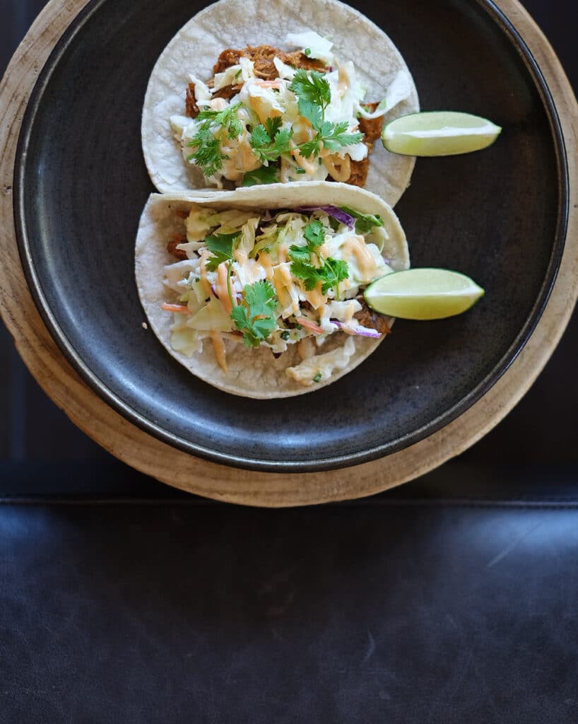 Cozy up with our delicious Achiote Pork Tacos!